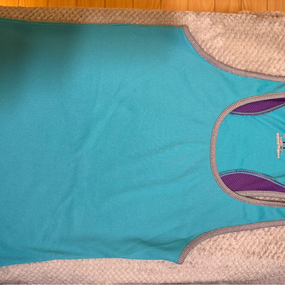 Under Armour Heat gear Turquoise Tank with Pop of Purple.